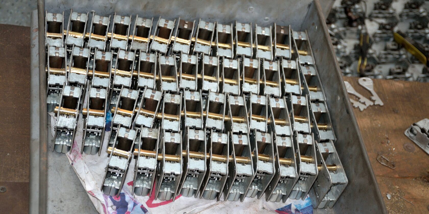 A rack of padlock bodies part-assembled, held as one lot