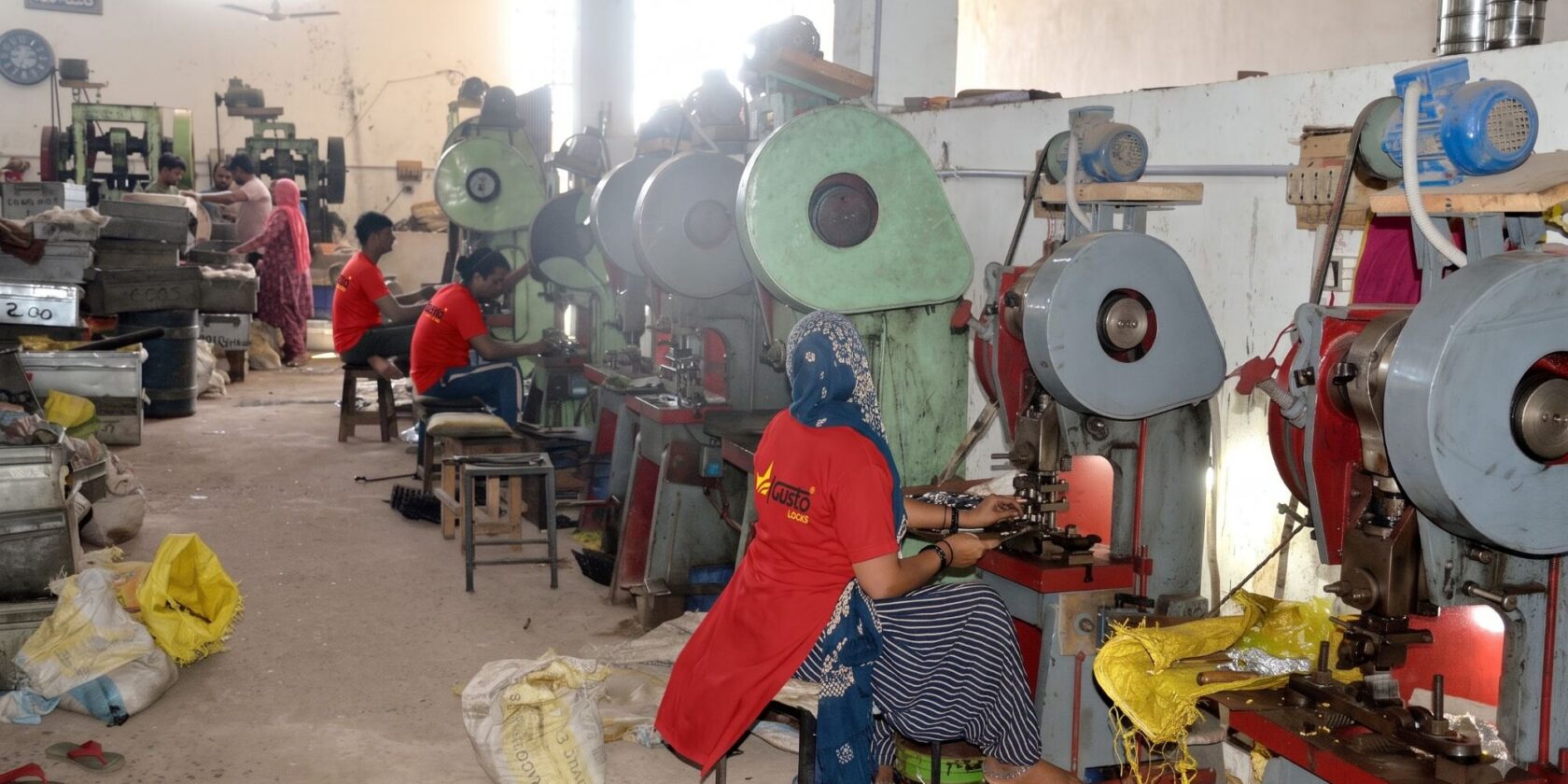 Operators in Gusto Locks uniform working power presses